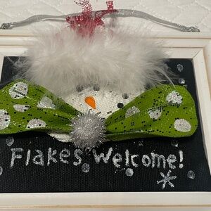 Festive Snowman Wall Decor with Green Bow